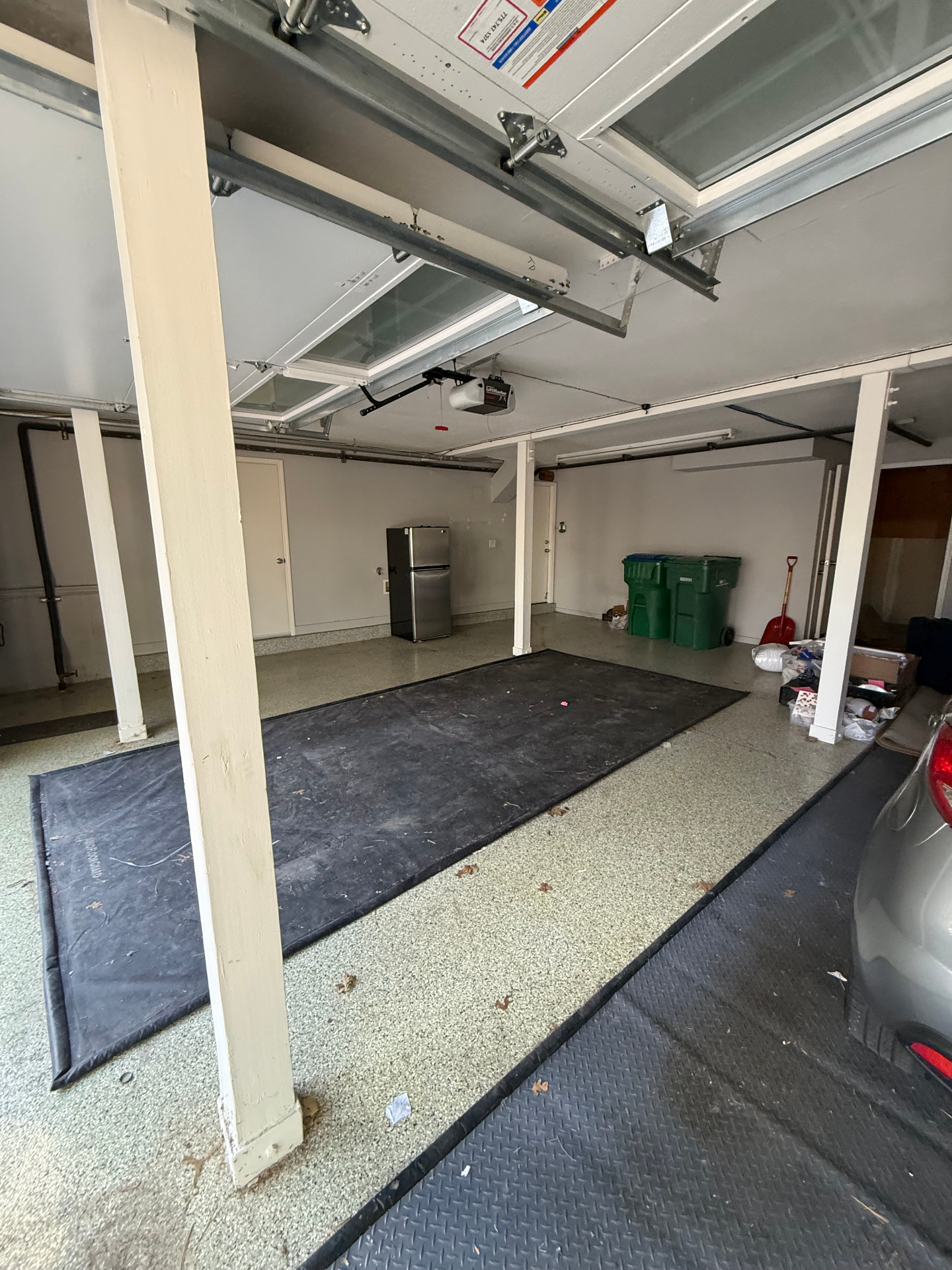 Same garage swept clean and emptied after removal